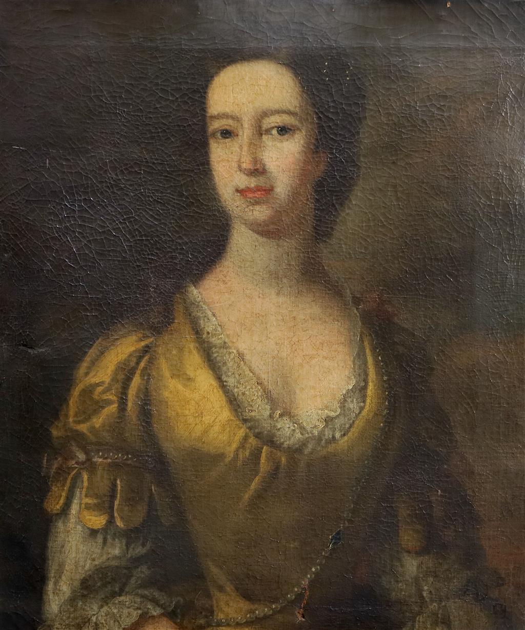 18th century English School Portrait of a lady wearing a gold silk dress 28.5 x 23.5in.